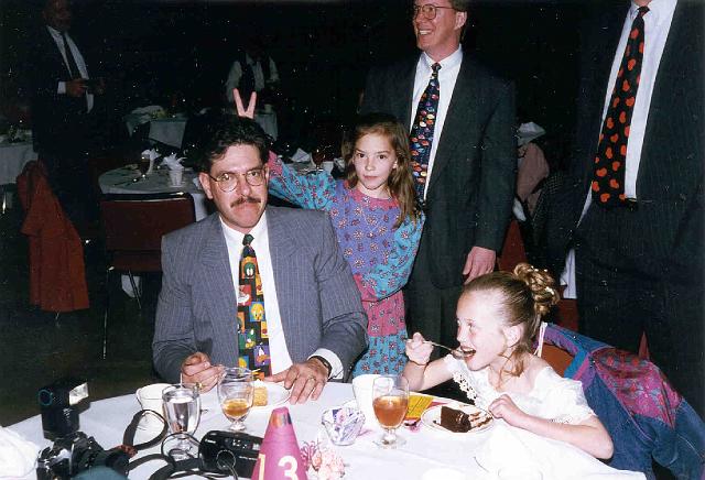 Joe and Angie Quattrochi at table with Mallory and Larry Box behind.jpg